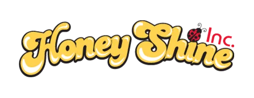 Honey Shine Inc's logo has yellow text, with a ladybug and the text "Inc" at the very top.