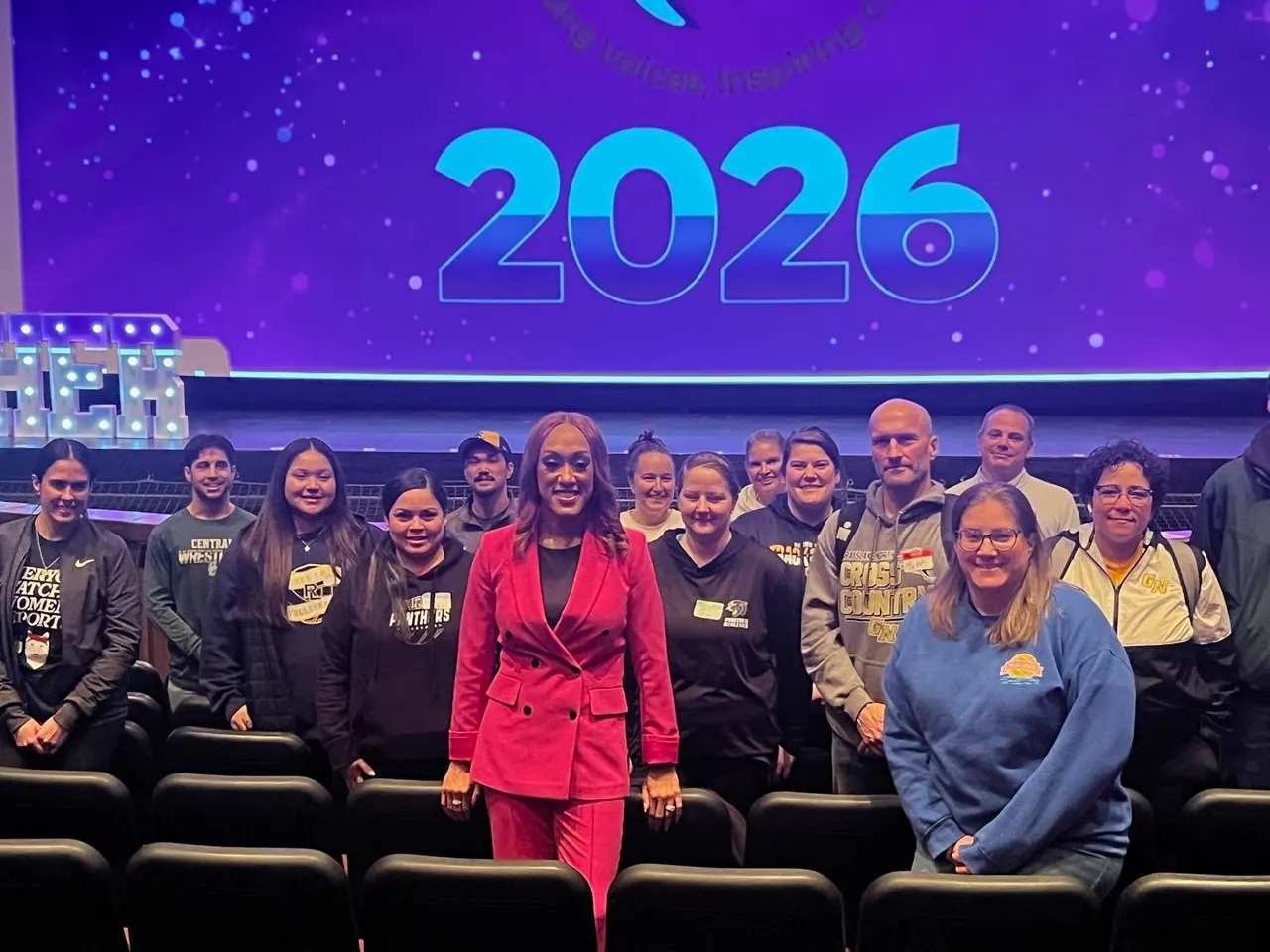 Dr. Wendy Ellis Jones, the NIL Doctor, poses with the audience of student athletes from the Empower HER Conference in Northbrook, Illinois. Dr. Wendy spoke with students and parents trying to understand NIL, and helped women learn about professional development organizations.
